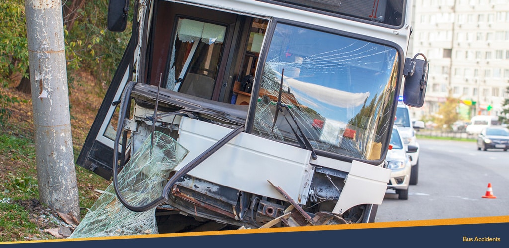 Photo of a bus with the windshield falling off from an accident, Bus Accidents